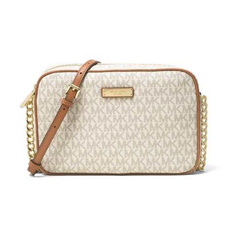 michael kors black and silver jet set crossbody|Michael Kors vanilla jet set.